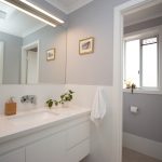 Clean white and grey renovated bathroom sink